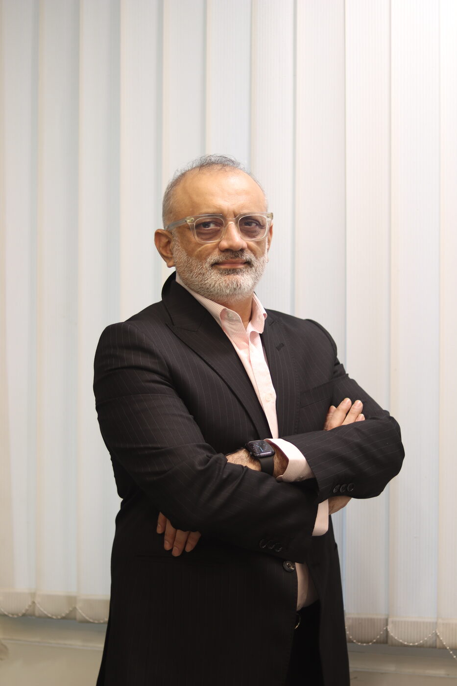 Abhijit Bhave in a formal suit